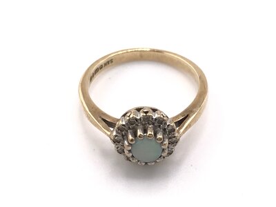 A 9ct gold Opal set ring.
Size N and 2.82g