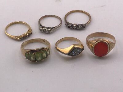 Six gold rings including 9 ct total weight 15 grams.
