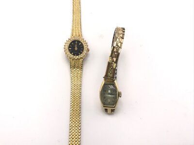An 18ct gold case vintage ladies watch and one other watch.
