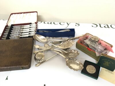 A collection of silver plated cutlery including cased cutlery and a quantity of coins including 1951 Festival of Britain crown and other coins.