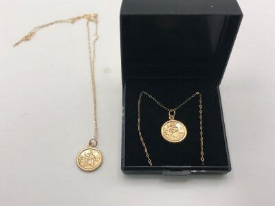 2 9ct gold chains with st Christopher pendants. 
1.85g