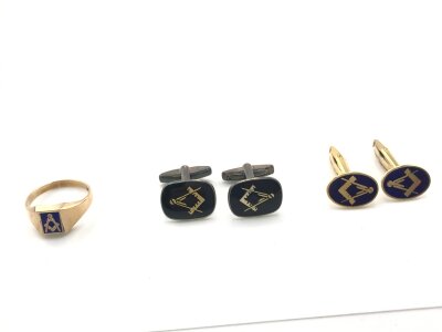 A 9ct gold Masonic reversible ring size U and 4.47g along with two pairs of Masonic cufflinks one silver and one yellow metal.