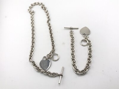 Two Tiffany and Co style items including a bracelet and necklace.
78.77g