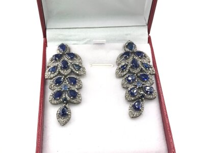 A pair of silver articulated drop earrings with pear shaped Kyanites and diamonds. Kyanites approx 6ct and diamonds approx 2 cts