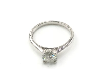 Platinum round cut diamonds solitaire ring with cert. 1.09tc diamond.
Size N