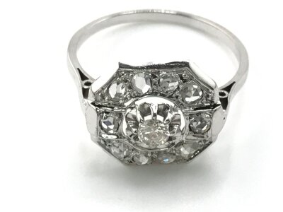14ct white gold art deco ring set with central diamond surrounded by rose cut diamonds with a vintage style box. Approximately 0.50ct diamonds. Size O 1/2.