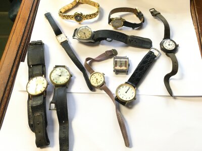 A box of vintage watches used spares or repairs