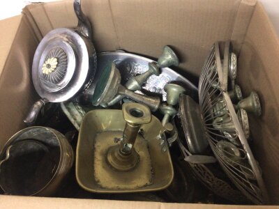 A box containing silver plate and brass ware