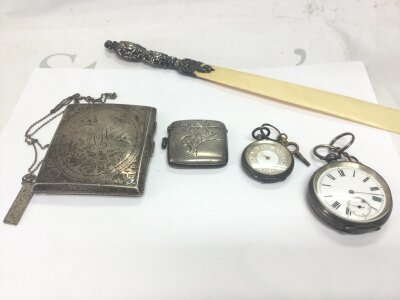 A collection of various silver items including cigarette case pocket watches ingot etc
Approx 270g total