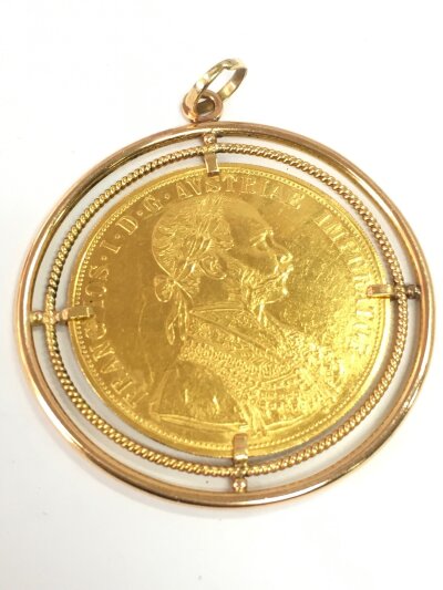 A 1915 Austrian 4 ducat gold coin in an unmarked gold mount. Total weight 24.8g