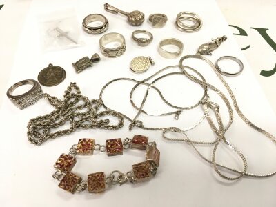 A mixed lot of silver Jewellery including rings and chains, 136g total weight Approx