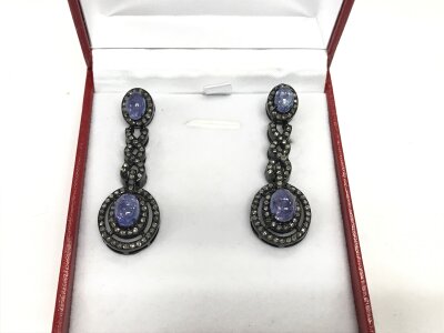 Tanzanite and diamond silver long drop earrings. Approximately 1ct tanzanite and 1ct diamonds.