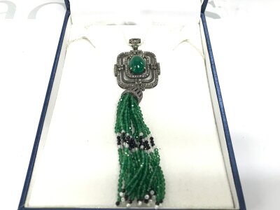 A large Jhumke style silver necklace set with oval cabochon green onyx diamonds and green and black onyx with crystal bead tassel with black rhodium coating. onyx 8ct approx 1.50ct diamonds and 8ct beads approximately