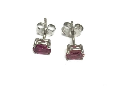 A pair of pink tourmaline studs set in silver.