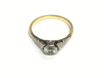 A 18ct gold and platinum ring set with CZ solitaire. Size N 1/2 and 2.64g