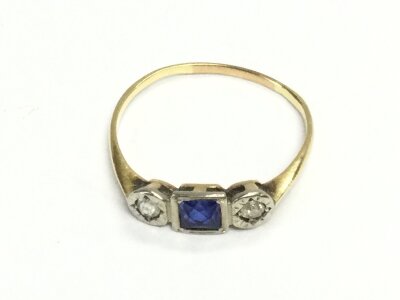 A 1920s sapphire and diamond unhallmarked gold ring. Size O and 1.28g