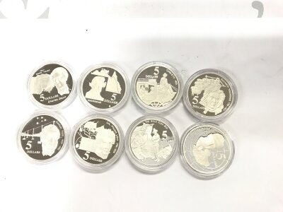 8 sterling silver coins each weighing approximately 35g