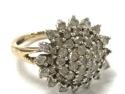 A 9ct gold cluster diamond ring, size K. 3.7g