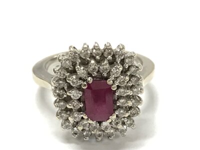 An 18ct Ruby and diamond cluster ring, size L, 7g