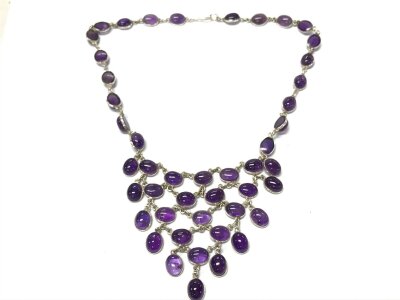 An unmarked silver and amethyst necklace