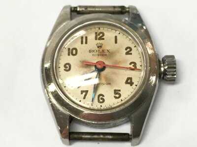 A Rolex oyster precision chrome watch, no strap and not seen running. Circa 1960s approximately 24mm case