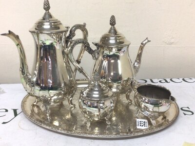 A Silver plated coffee set with a matching oval tray.