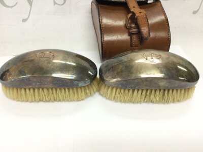 A vintage pair of hallmarked silver brushes