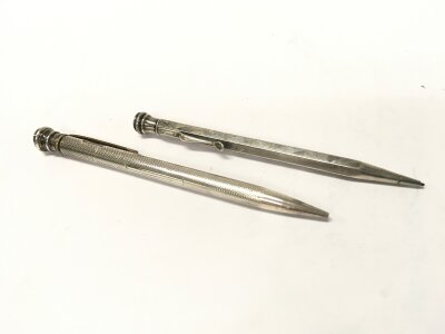 Two silver hallmarked pencils, 30 g total weight