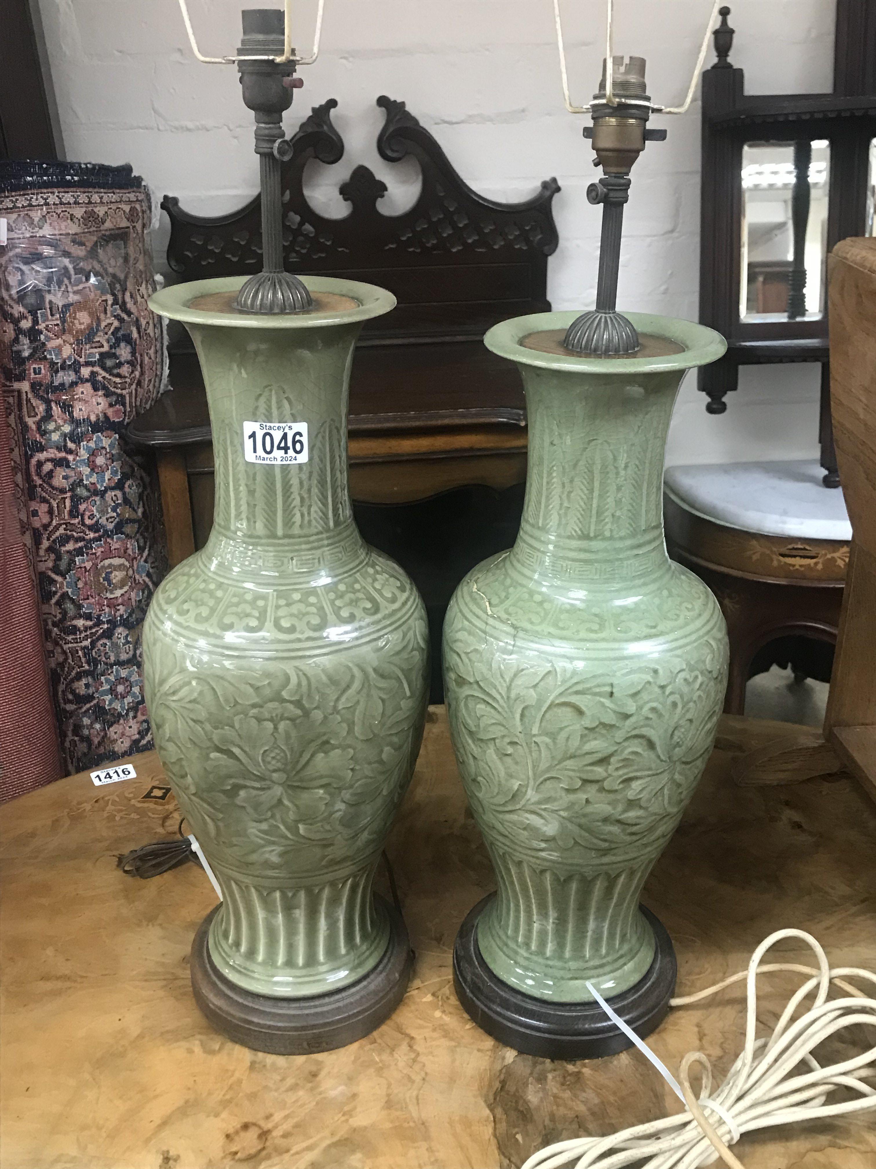 A pair of Chinese crackle glazed celadon vases converted to lamps, close match pair 49cm/51cm. (1 lamp with significant damage). Postage category D.