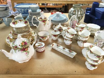 a Royal Albert country rose set including a teapot, cups, saucers,