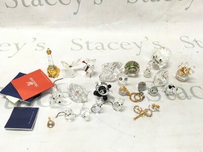 A box of unboxed Swarovski animals, keyrings etc