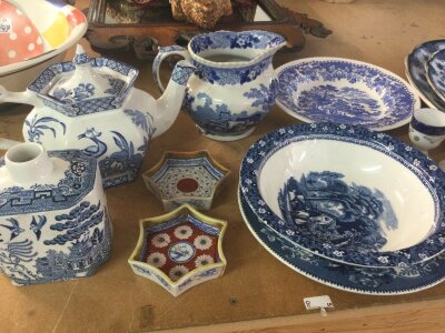 A collection of assorted blue and white ceramics.