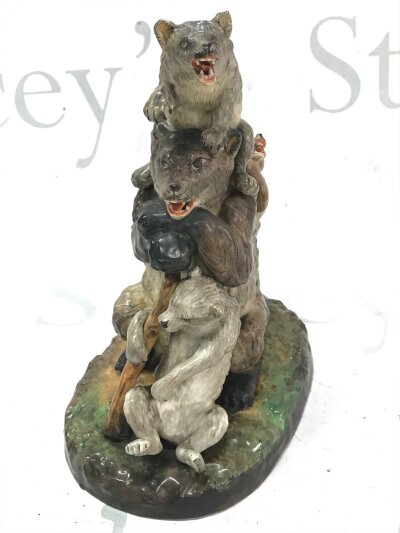 A German porcelain bear figure group, 18cm tall