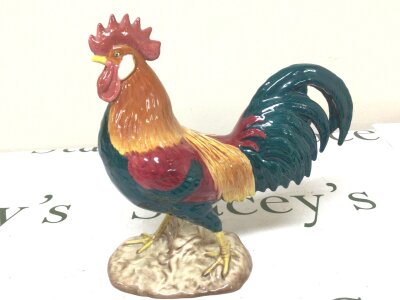 A Beswick ceramic figure of a Leghorn Cockerel no damage. Hight 24cm