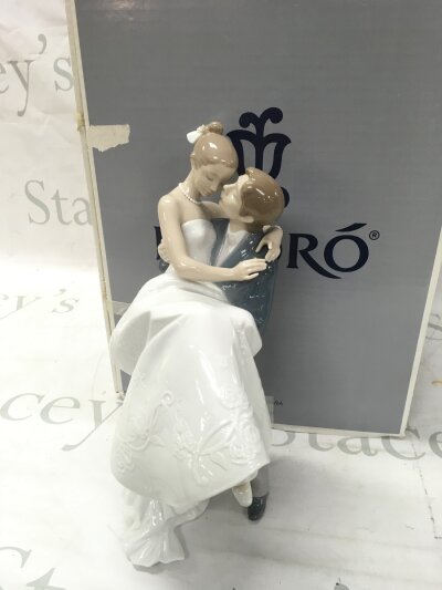 A boxed Lladro porcelain figure group ,The Happiest Day. No obvious damage or restoration