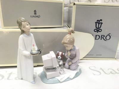 Three boxed Lladro figures, Lladro Girl With Lighted Candle Figurine , Computing Companions porcelain figurine, Let's Make Up damaged in need of restoration and will be left inside the box . The other two have no obvious damage or restoration