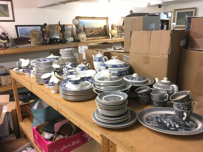 A Wedgwood Blue Siam dinner service including plates, tea pots, cups, saucers etc and a Rustic Victoria porcelain set