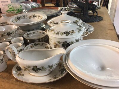 A Royal Doulton Larchmont dinner service with coffee set comprising graduating plates soup bowl’s tureens no obvious damage.