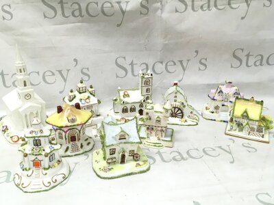 A Collection of Coalport ceramic cottages