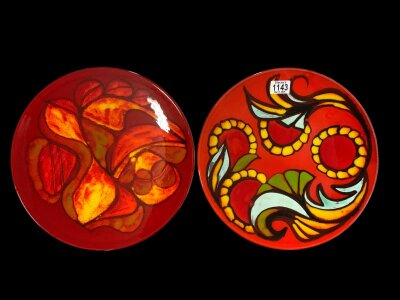 A large Poole pottery Delphis chargers., Each 35cm.