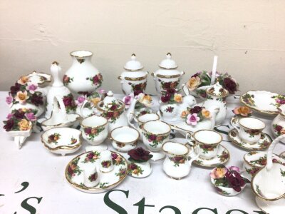 A Collection of Royal Albert bone china ornaments vases, miniature tea sets flower arrangements and more