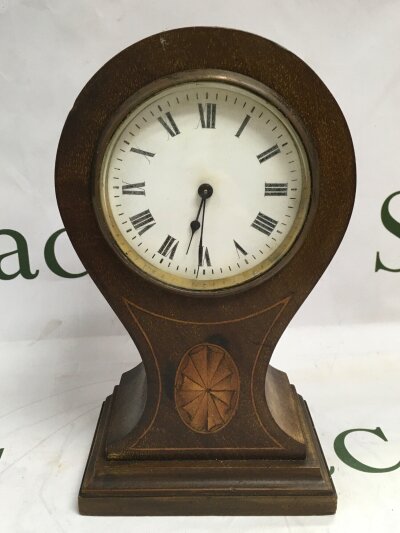 A 19th century antique balloon style mantle clock.- NO RESERVE