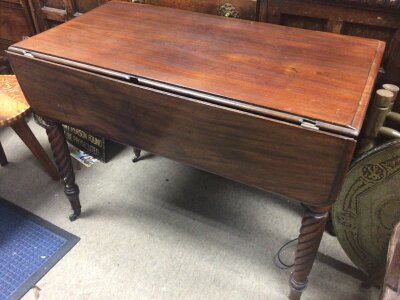 An Early Victorian mahogany Pembroke table with twin flap and twist turned legs. Fitted with a single drawer.- NO RESERVE