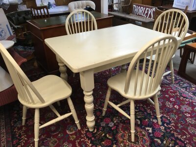 A white painted Kitchen table and four chairs- NO RESERVE