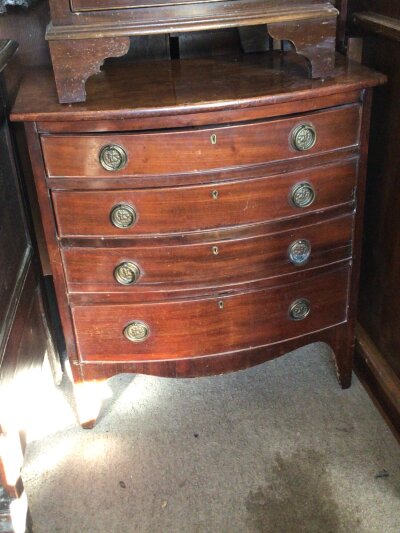 A Small petite late George III Mahogany bow fronted chest of drawers fitted with four graduating drawers width 66cm Hight 70cm60