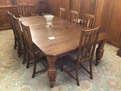 A large Edwardian extending Oak dining table with four extra leaves and a set eight chairs. Sold in situ buyer to collect viewing by appointment only. Post Code for collection RM14 1DW.