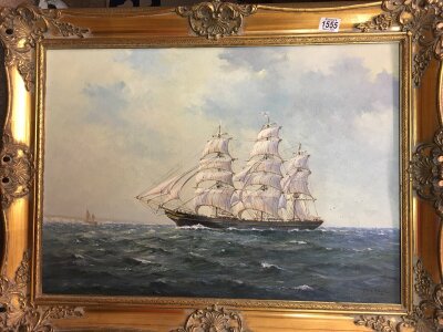 A framed oil on canvas depicting a three mast sailing ship at sea, by Colin Moore. 50cm x 70cm