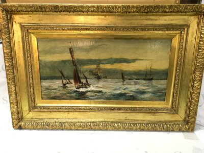 A gilt framed painting in the manor of William Lionel Wyllie (1851-1931) maritime scene titled Near Rochester. Canvas size 59x29cm. Frame size 86x56cm