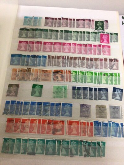 A collection of ten albums containing British Elizabeth II stamps used and unused including an album of foreign stamps and an Early 20th Century album (no stamps in it)