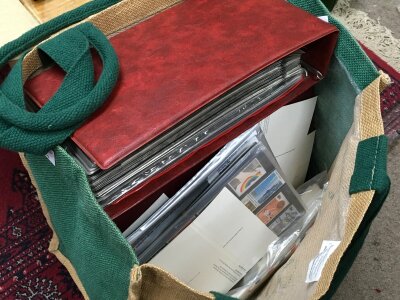 A Collection of Elizabeth II presentation packs in albums with some first day covers